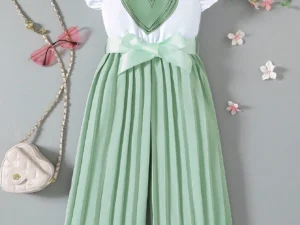 Combinaison fille sans manches avec col asymétrique et volants multicouches élégants