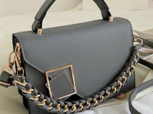 Sac bandoulière femme mini avec chaîne tissée, rabat et fermeture verrou élégante